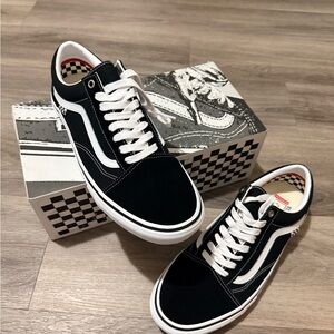 Vans Black & White Low-Top Canvas Sneakers